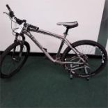 A Specialized mountain bike. 24 speed with front suspension and hydraulic disc brakes (R26)