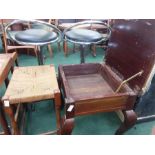 A piano stool together with a string seated stool.