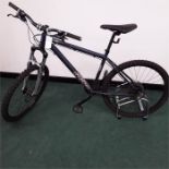 A Voodoo mountain bike. 24 speed with front suspension and hydraulic disc brakes. Good condition