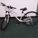 A Carrera girl’s mountain bike. 21 speed with front suspension. Nearly new and in good condition (