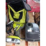 A Ryobi 18v battery drill with charger and case.(63).