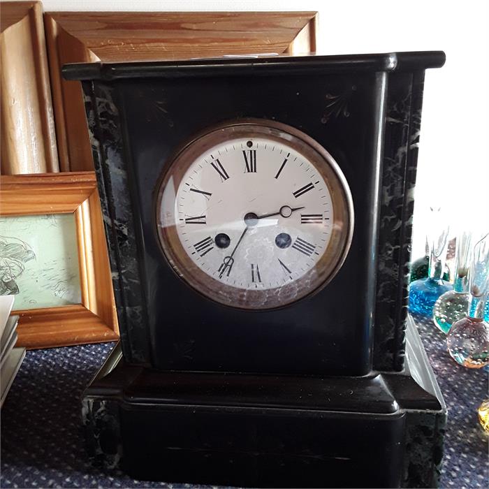 A slate mantle clock.