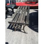 A cast iron ended garden bench.