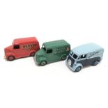 Three Dinky commercial vans: 452 /31c Trojan 'Chivers Jellies' Van (G/VG); 451 Trojan 'Dunlop'