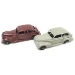 Two Dinky Toys 39 series cars: 39d Buick Viceroy Saloon in maroon with black ridged hubs (minor