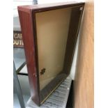 Wooden display cabinet with glass window and shelves. Requires a clean. Measures 61 x 91.5cm.