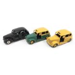 Three Dinky Toys 40h/ 254 Austin Taxi models: black body, chrome spun hubs, dark grey base/