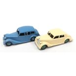 Two Dinky cars: 40b Triumph Saloon in blue with blue hubs; 40a/ 158 Riley in cream with green