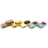 Five Dinky cars: 139a Ford Fordor Sedan in yellow; 171 Hudson Commodore Sedan in cream with maroon