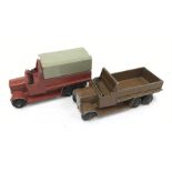 Two Dinky Toys 151b Military Covered Wagons, one in brown (F, no metal tilt) the other in reddish-