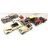 Six Franklin Mint 1/24 scale models:1933 Duesenberg SJ Twenty Grand; 1935 Auburn 851 Speedster; 1930