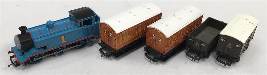 Hornby Thomas The Tank Engine 0-6-0 locomotive, together with two coaches and two vans. Appear VG,