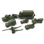 Seven Dinky Toys military models, includes 660 Tank Transporter and 641 Army Truck with figures.