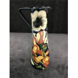 A Moorcroft 9.5 inch high ewer made in 2005.