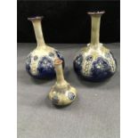 A pair of Doulton Lambeth Art Nouveau vases , 16cms. High (ref. 6473) together with a small vase (