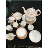 A Victorian teaset for 12 people ( one cup missing), including cups, saucers, plates, two bread