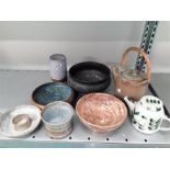 Eight pieces of studio pottery by artist C.Lock.