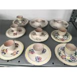 9 Poole Pottery egg cup sets.