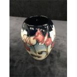 A Moorcroft ovoid shaped vase 5.5” high circa 2001.