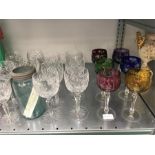 A set of six coloured hock glasses together with six plain hock glasses and eight others and a large