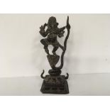 An antique cast bronze statue of a Hindi figure, Shiva or Ganasch.