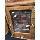 A Clown Catcher coin operated machine on old penny play with keys.