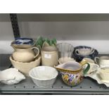 A collection of porcelain jelly moulds, a blue and white china bowl and other china.