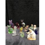 A Royal Albert Beatrix Potter figure group together with a collection of glass cats, birds and other