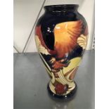 A large Moorcroft mushroom vase in the Parasol Dance design.