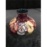 A Moorcroft squat vase, 4” high.