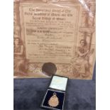 A 9ct gold medal awarded in 1905 for violin playing together with the associated certificate from