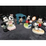 4 items: Mickey & Minnie Bride & Groom, Minnie playing tennis, Mickey playing football, Mickey &