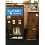 A Player’s Cigarette machine with another Wills cigarette machine.