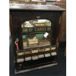 An Argyle Edwardian fortune telling machine on old penny play with keys.