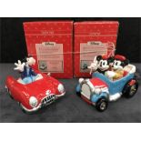 Two Schmid Disney music boxes - Goofy, and Mickey & Minnie Mouse in cars (with original boxes).
