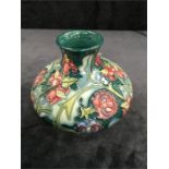 A Moorcroft squat vase 4” high by Rachel J Bishop.