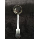 A Georgian silver fiddle pattern sugar sifting spoon London by Preistly.