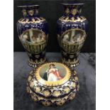 A pair of large vases of blue ground decorated with gilding together with a similarly decorated