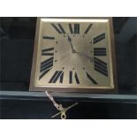 An Art Deco brass clock, CH Hour.