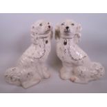 A pair of large Staffordshire Spaniel hearth dogs, 12½" high