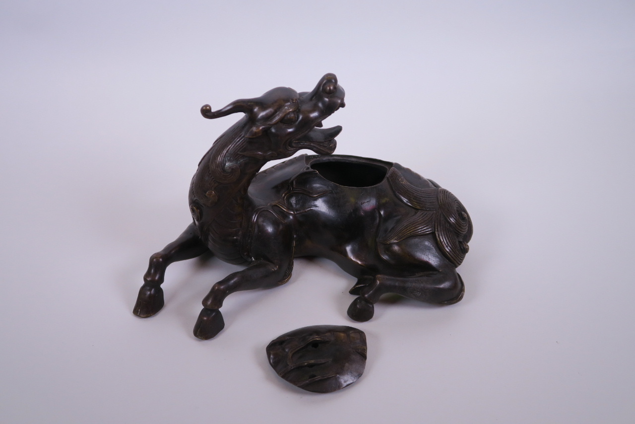 A Chinese bronze censer and lid in the form of a horse, 9½" long - Image 2 of 2