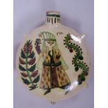 A Turkish Kütahya pottery moon flask painted with a woman and flowers, 6" diameter