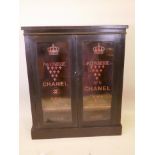 A painted display cabinet with decorative stenciled glass doors, 34" x 12½", 40½" high