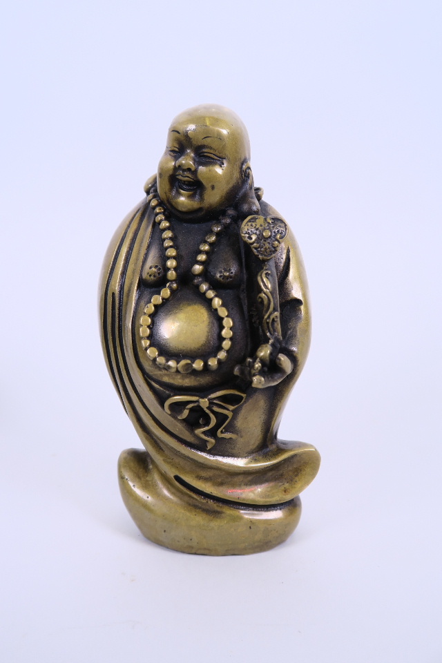 A Chinese bronze of a jolly Buddha, 5½" high