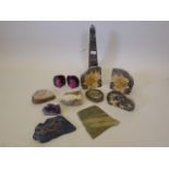 A collection of geological specimens, including lapis, quartz, amethyst and a pair in the form of