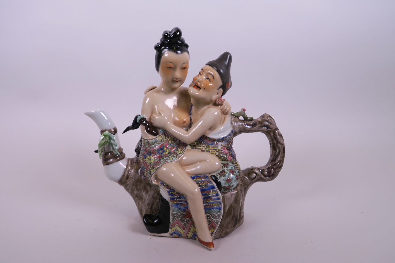 A Chinese polychrome porcelain erotic teapot, 8½" wide