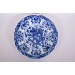 A Chinese blue and white charger with lobed rim and dragon decoration, 6 character mark to