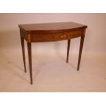 A C19th inlaid mahogany bowfronted tea table, raised on square tapering supports, 34" x 17½" x 30"