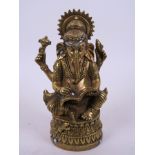 A Sino-Tibetan bronze figure of Ganesh, double vajra mark to base, 6½" high