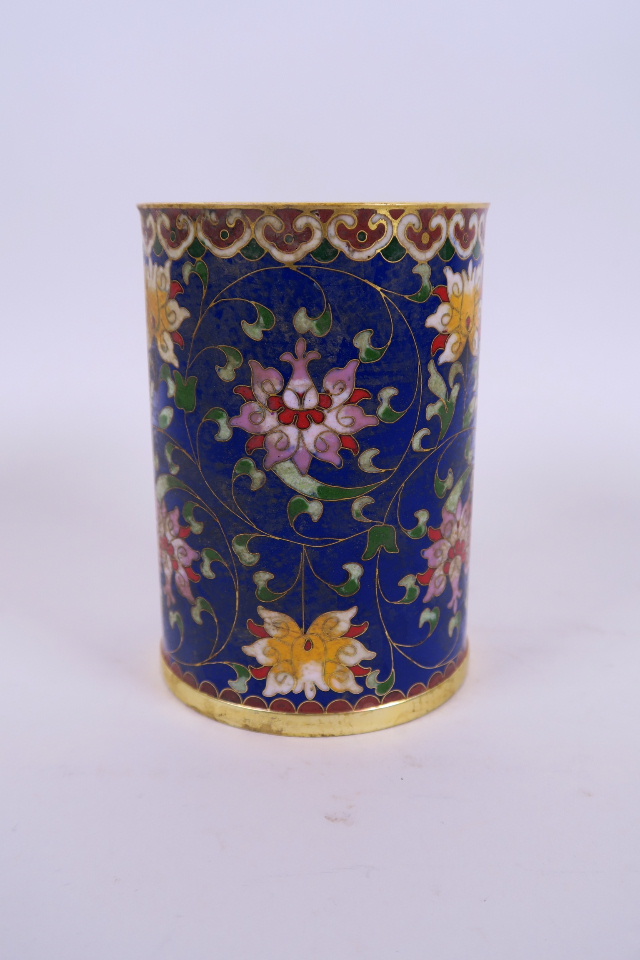 A Chinese cloisonné brush pot with lotus flower decoration, 5" high, 3½" diameter